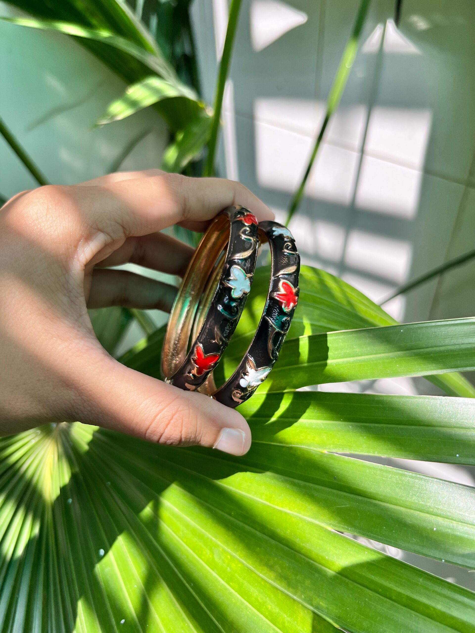 Elegant Black Enamel Butterfly Bangles with Golden Accents - Image 2