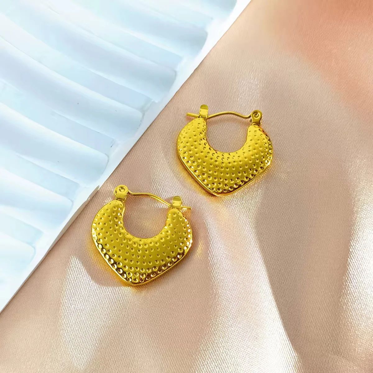 Hammered gold crescent hoop earrings for women